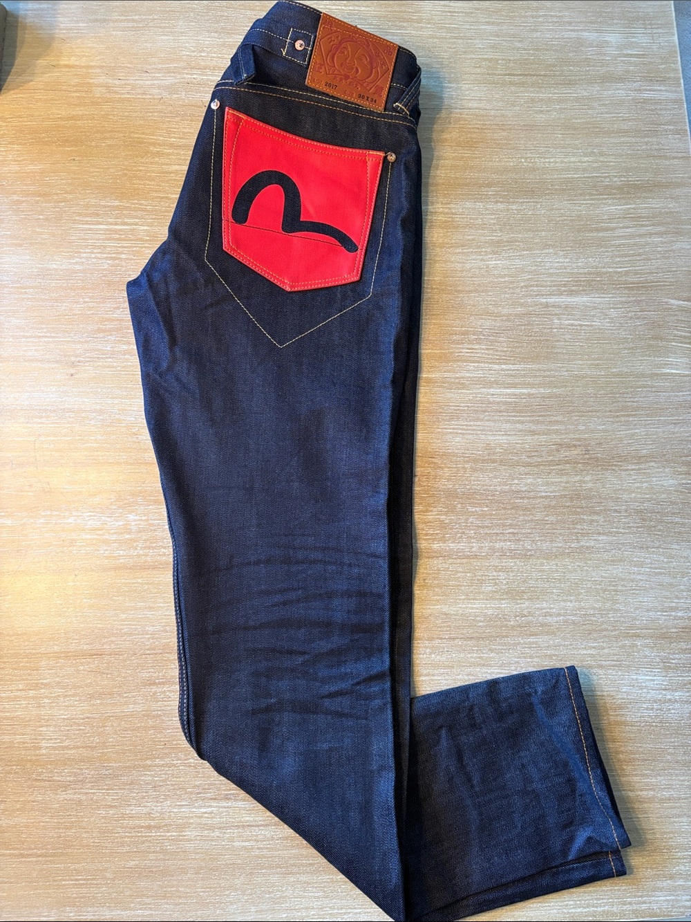 Evisu Dark Indigo Jeans with Red and White Back Pocket Accent